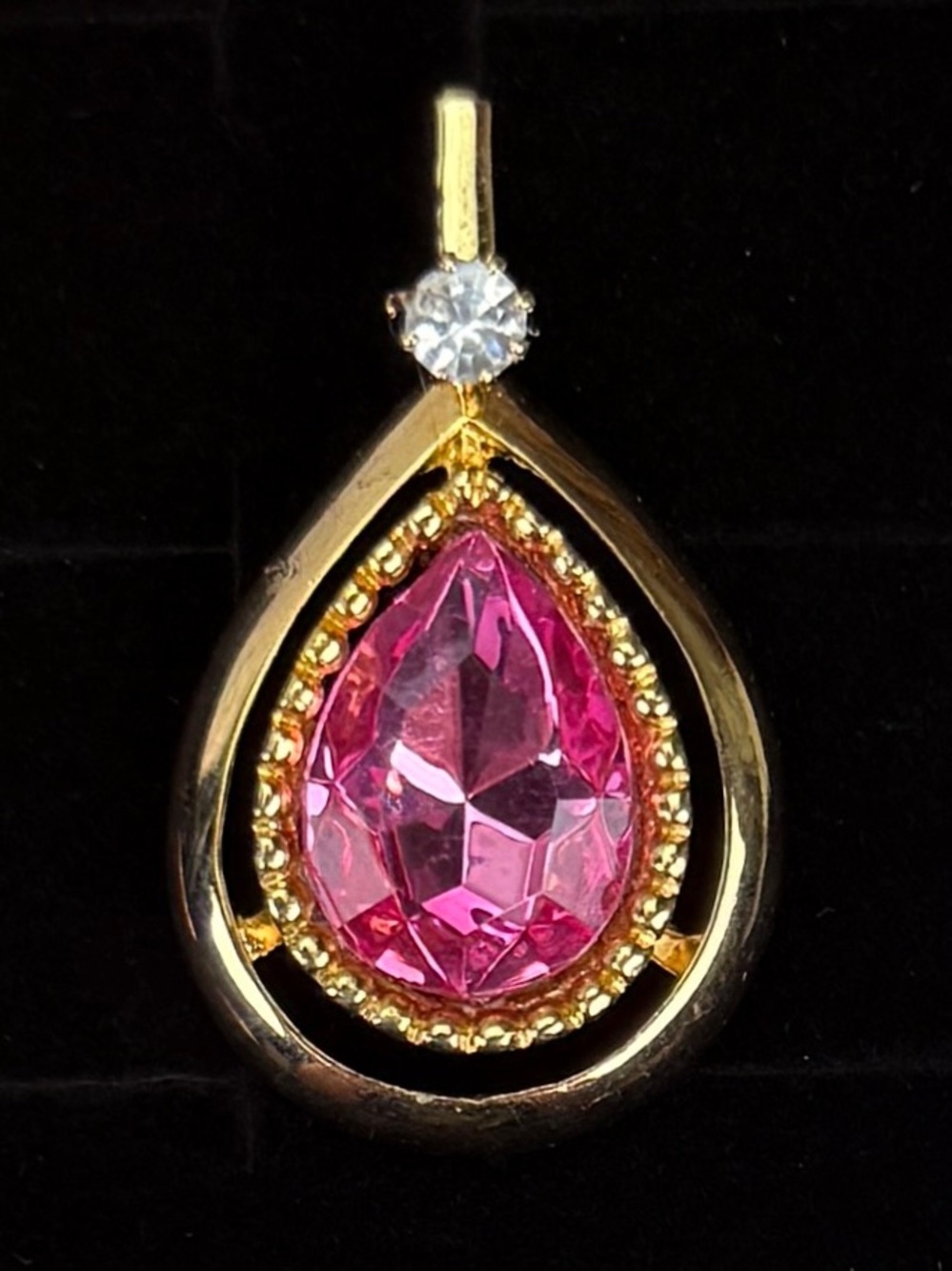 Pretty goldtone and pink bling costume pendant, vintage